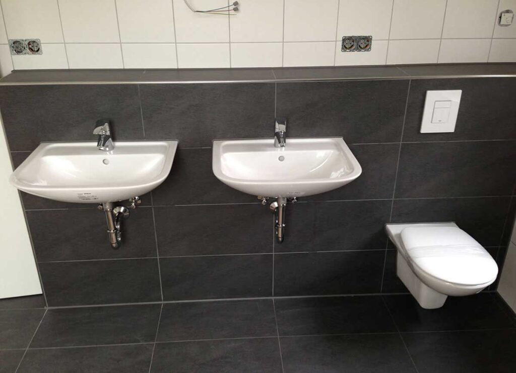 Newly built and renovated bathroom with double sink