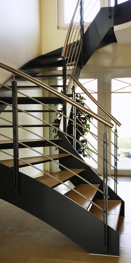 spacious arched staircase from the Roetzer brick house